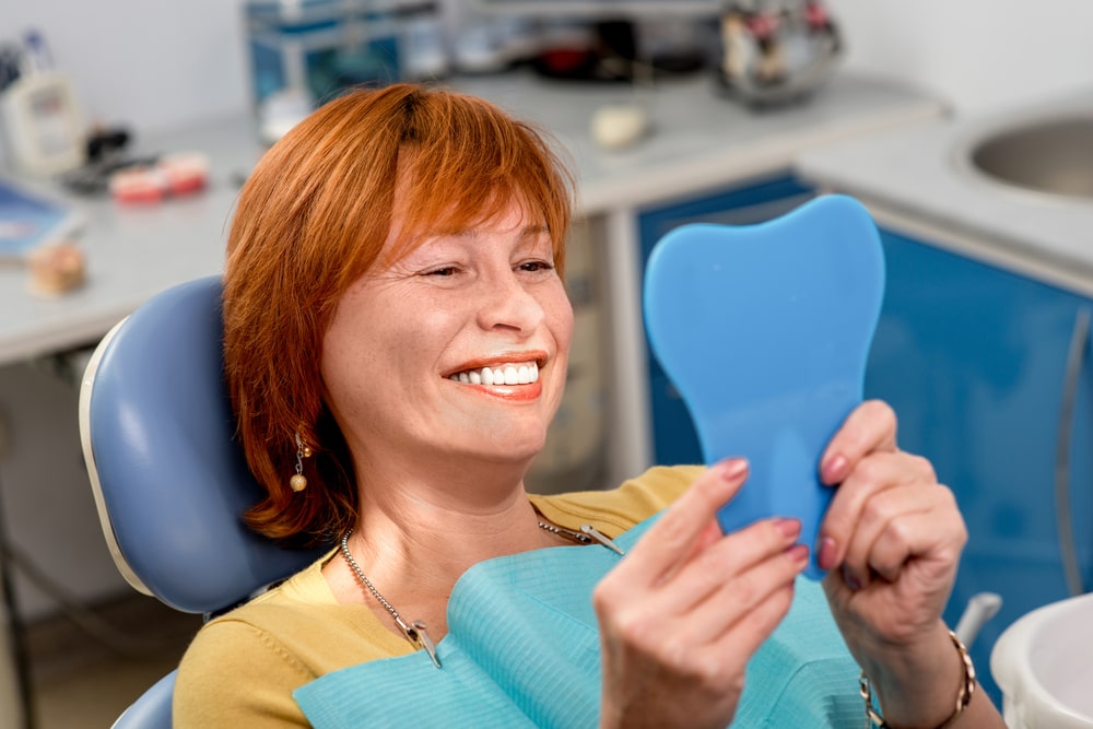 smiling dental patient root canal treatment wareham ma